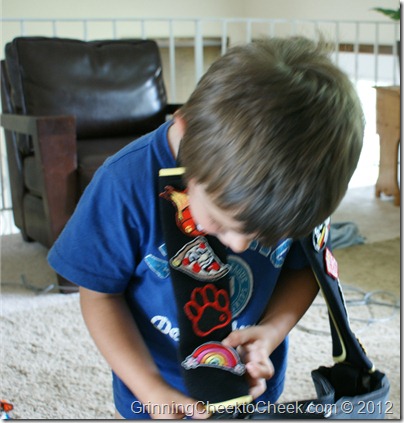 Gutzy Gear, boy examining patches