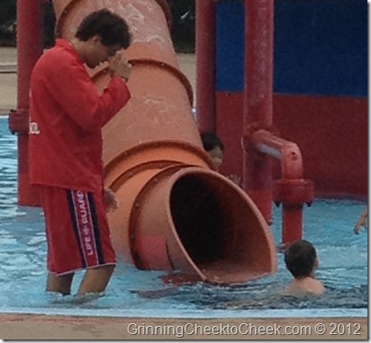 boy with coach at waterslide