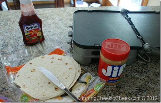 making peanut butter and jelly quesadillas