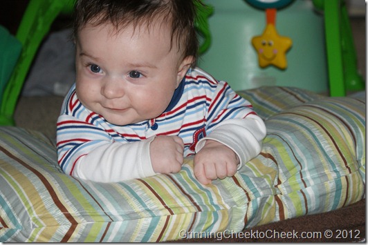 baby on play mat