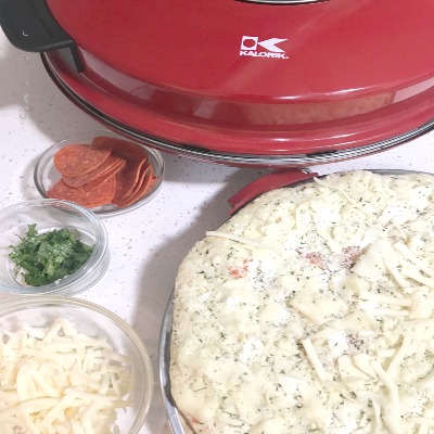 Kalorik Hot Stone Pizza Maker Review For Baking Pizza Made Easy! – Giveaway